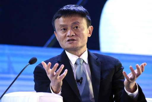 Head of anti-fakes group closely tied to Alibaba, owns stock