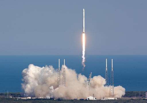 SpaceX launches futuristic pop-up room, lands rocket at sea