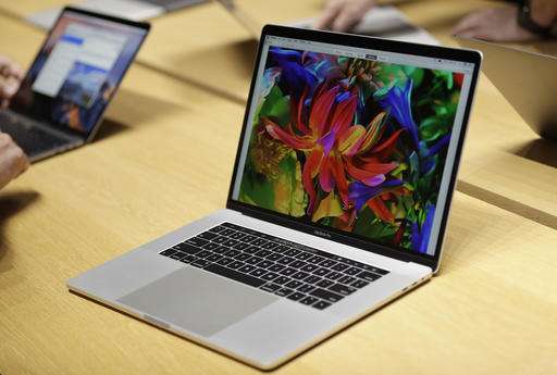 New Macs, Lenovo laptop make traditional keyboards touchy