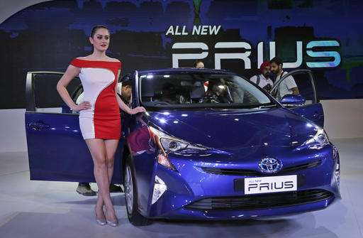 Automakers say electrics, hybrids no longer just gas-sippers