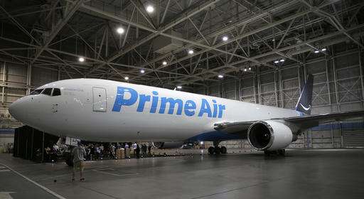 Amazon unveils cargo plane as it expands delivery network