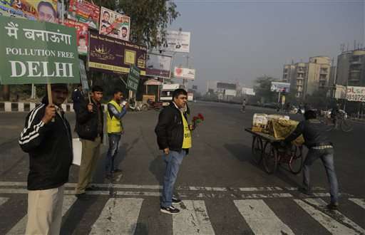 Indian capital starts limiting cars for two weeks to clear air