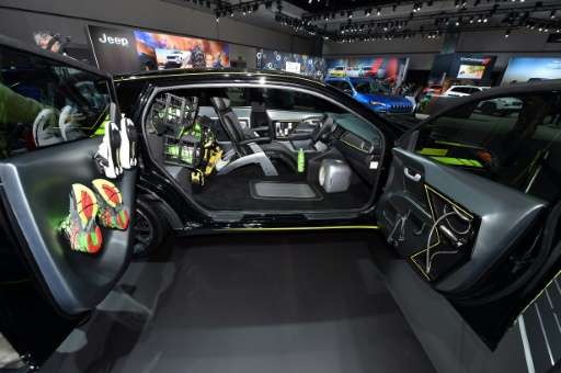A 2017 Kia Niro Triathlete Inspired autonomous concept car with a shower head in the passenger door is on display at the Los Ang