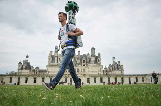 A Google Tracker Man walks around the Chambord Castle,  taking panoramic pictures for the Google map and Google Street in Chambo