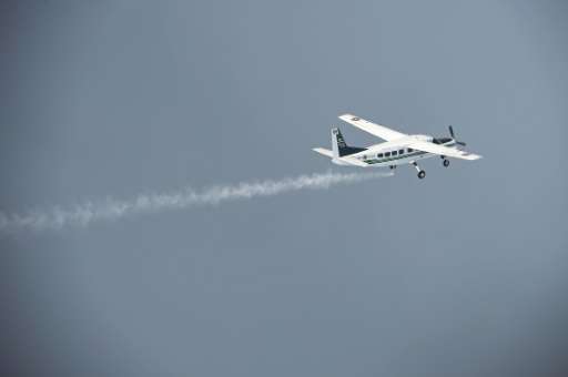 An aircraft from the Thai Department of Royal Rainmaking deposit a sodium chloride-based material above clouds in Nakhon Sawan i