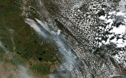 A NASA satellite image shows the Fort McMurray wildfire in Alberta, Canada