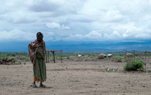 An elderly pastoralist woman walking in Sitti Zone, in the Somali Region of Ethiopia on April 16, 2016