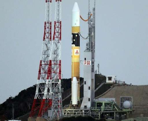 An H-2A rocket carrying the Astro-H satellite on the launch pad at Japan's Tanegashima Space Center on February 17, 2016
