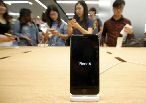 Apple has blamed &quot;external physical damage&quot; for causing a handful of iPhones to explode or catch fire in China