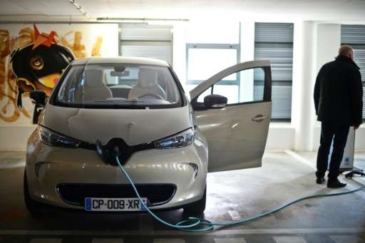 A Renault Zoe electric car at a charging point in Lisbon