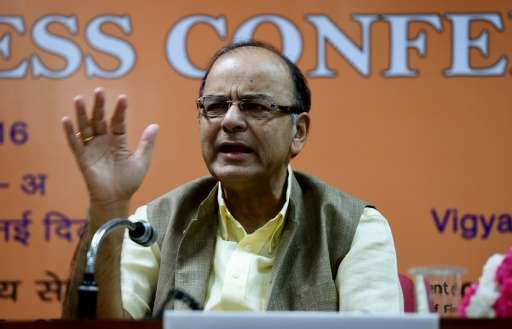 Arun Jaitley says the sale of mobile phone licenses may be India's largest ever auction