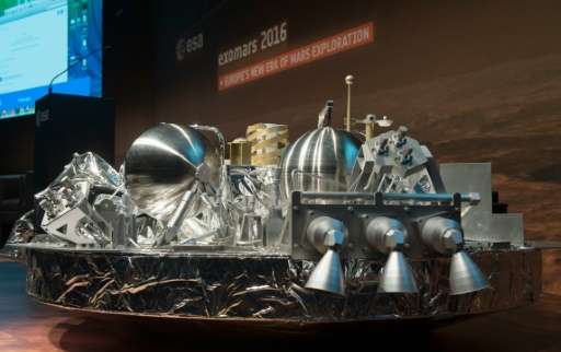 A scale model of the Schiaparelli landing unit that will scour the Red Planet for signs of life