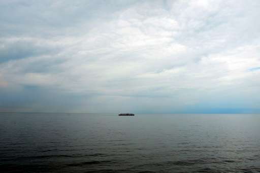 A ship sails in the Baltic sea after leaving the Ferry Terminal of the Travemuende port, northern Germany, on June 22, 2013