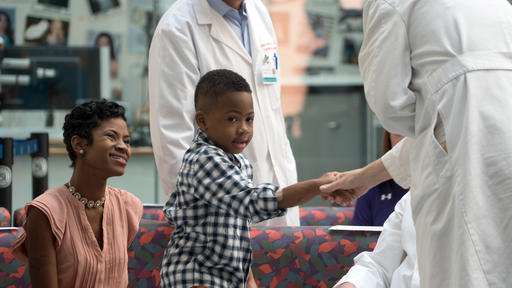 Boy with double-hand transplant's next goal: Play football (Update)