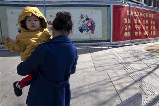 China: No plan for couples to have as many kids as they want