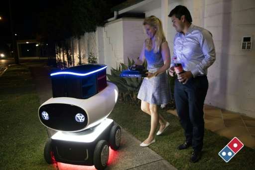 Domino's new trial pizza delivery robot in New Zealand is just under a metre (three foot) high and contains a heated compartment