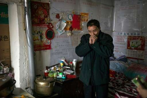 Former miner Lu Zhanyong faces unemplyment as demand for coal in China drops