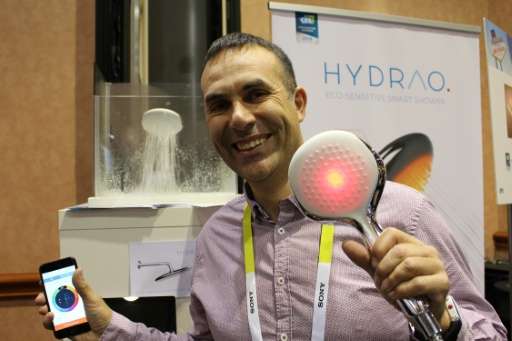 French engineer Gabriel Della-Monica on January 4, 2016 at the Consumer Electronics Show in Las Vegas, with a smart showerhead t