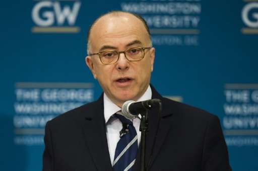 French Interior Minister Bernard Cazeneuve speaks at George Washington University in Washington, DC, March 11, 2016, during a di