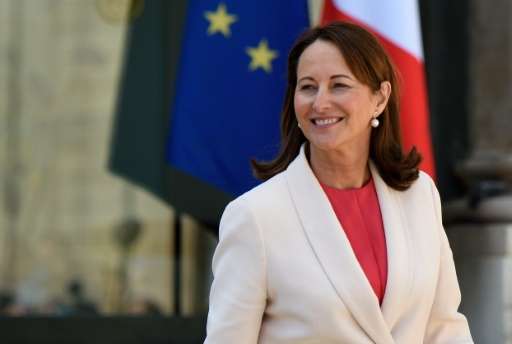 French Minister of the Environment, Energy and Marine Affairs Segolene Royal leaves after attending the council of ministers at 