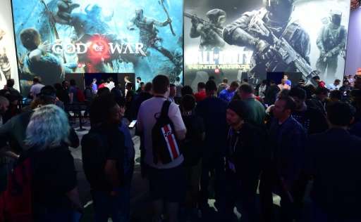 Gaming fans wait in line to sample 'Gods of War' and 'Call of Duty'  during the 2016 Electronic Entertainment Expo (E3) annual v