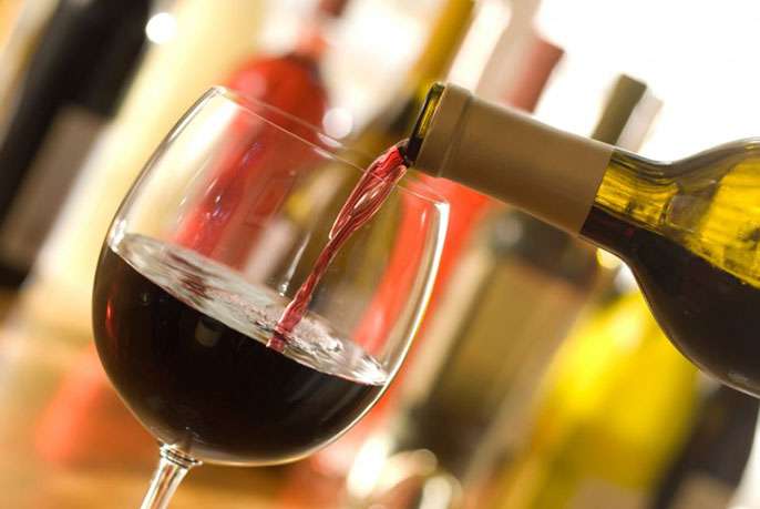 Greater alcohol use may reduce heart attacks, increase atrial fibrillation