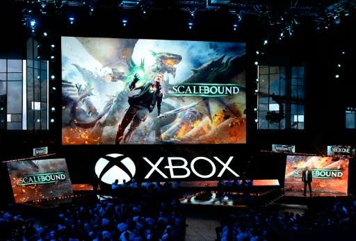 Hideki Kamiya, Director at Platinum Games, introduces the video game &quot;Scalebound&quot; during Microsoft Corp. Xbox at the G