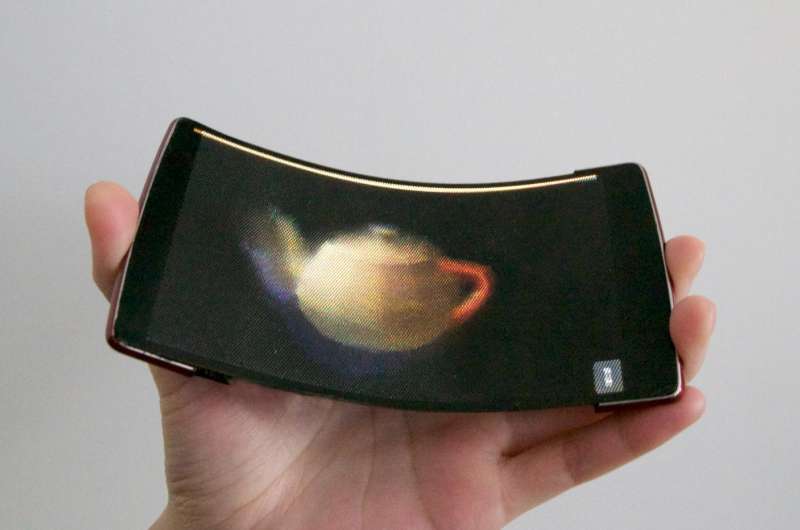 Holoflex: holographic, flexible smartphone projects princess leia into the palm of your hand