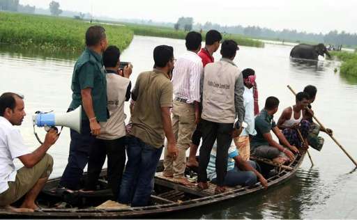 Huge crowds of villagers followed the wild elephant that was stranded in Bangladesh for more than a month