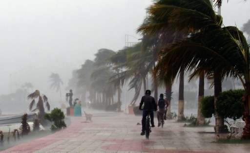 Hurricane Newton, since downgraded to a tropical storm, left two people dead as it roared across Mexico's northwestern Baja Cali
