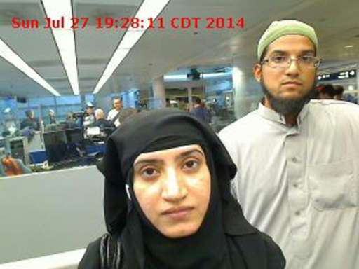 Image obtained from US Customs and Border Protection December 7, 2015 shows Syed Farook (R) and Tashfeen Malik as they went thro