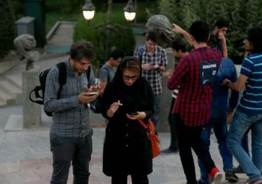 Iranians play Pokemon Go app in northern Tehran's Mellat Park on August 3, 2016
