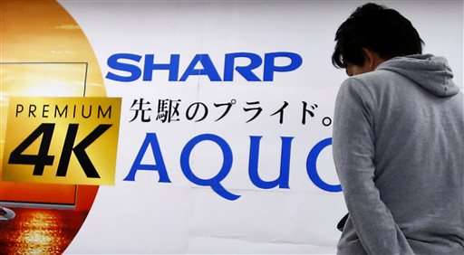 Japan's Sharp accepts takeover, Foxconn not ready to sign