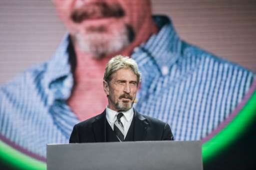John McAfee, founder of the eponymous anti-virus company, addresses the China Internet Security Conference in Beijing on August 