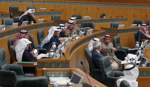 Kuwaiti MPs take part in a parliament session at Kuwait's National Assembly in Kuwait City on January 13, 2016