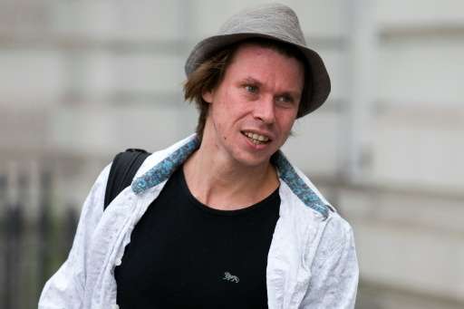 Lauri Love, pictured in July 2016, faces three separate charges for allegedly hacking into the networks of the US Federal Reserv