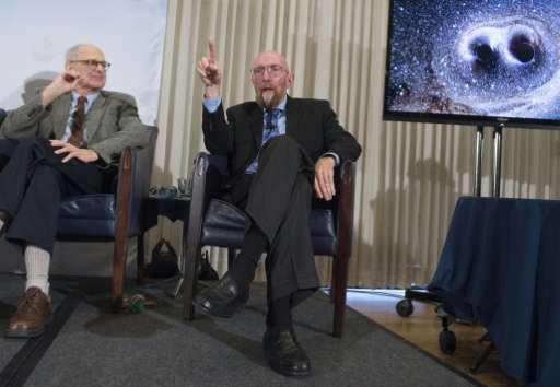 LIGO co-founders Kip Thorne (R), and Rainer Weiss (L), speak about gravitational waves during a press conference at the National