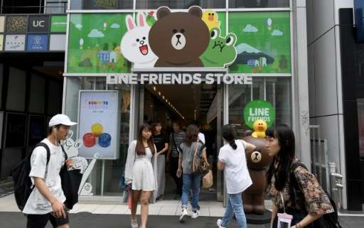 Line, owned by South Korea's Naver Corp, debuted in New York where its stock soared about 27% by the close