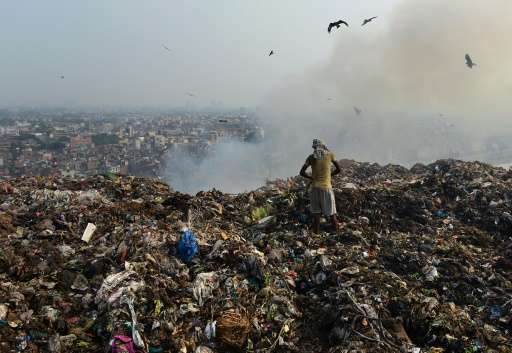 Locals living near the huge Ghazipur landfill in New Delhi site complain of chronic headaches, wheezing and recurring bouts of f