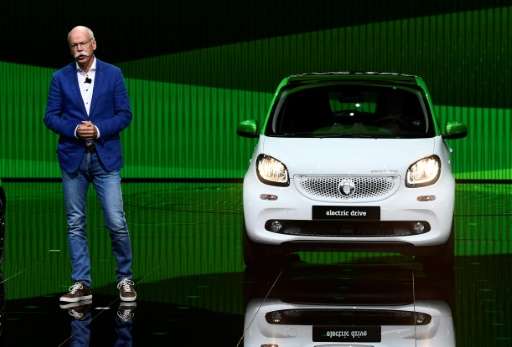Mercedes Benz CEO Dieter Zetsche presents a car from the Smart Electric drive range on the first day of the press days of the Pa