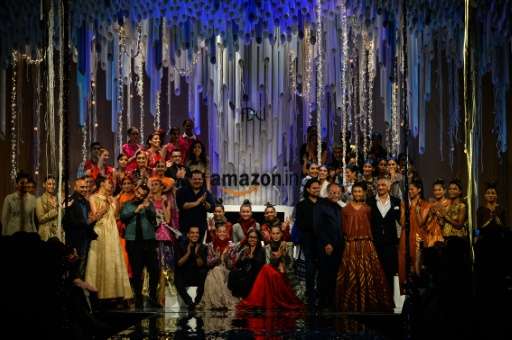 Models present creations by Indian fashion designers during the Amazon India Fashion Week Autumn/Winter 2016 finale in New Delhi