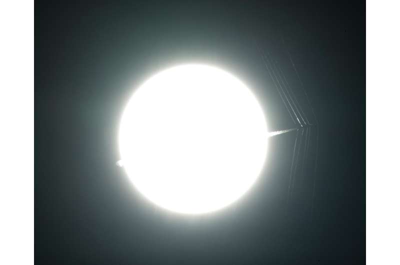 NASA image: T-38C Passes in Front of the Sun at Supersonic Speed