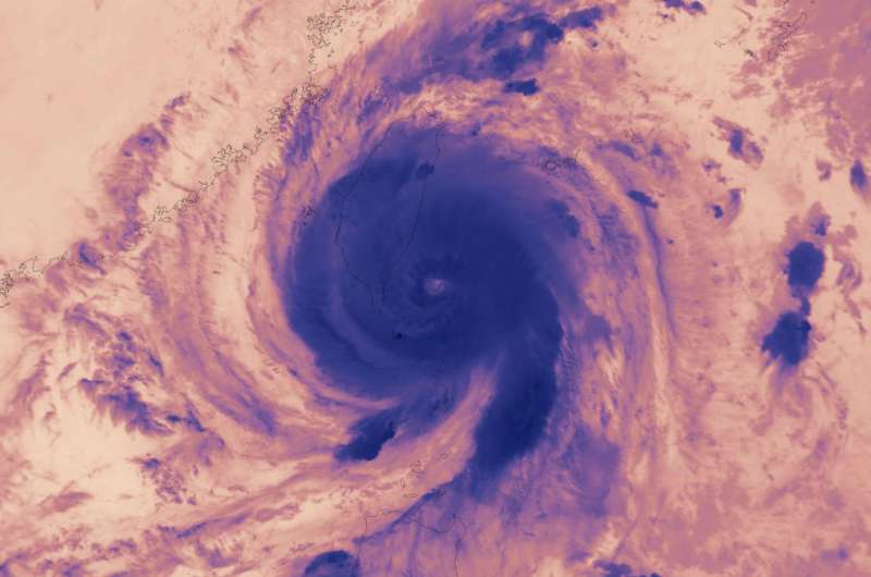NASA looks at Typhoon Nepartak over Taiwan in visible and infrared light
