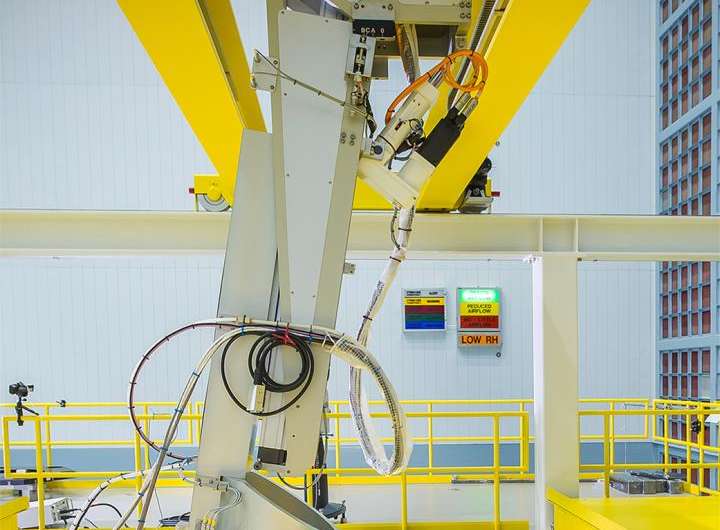 NASA Webb Telescope mirrors installed with robotic arm precision