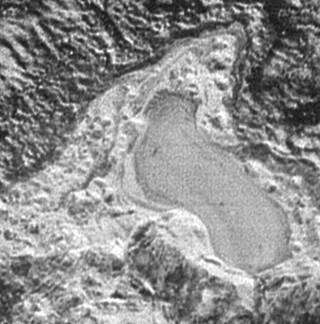 New Horizons imagery reveals small, frozen lake on Pluto