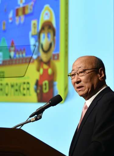 Nintendo President Tatsumi Kimishima announces the company's financial results and future of corporate strategy during a press b