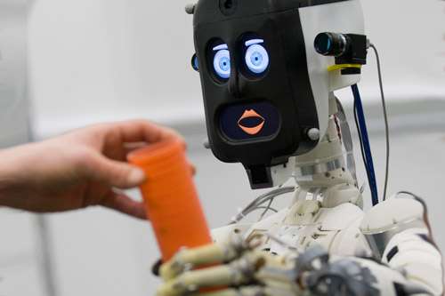 People favour expressive, communicative robots over efficient and effective ones