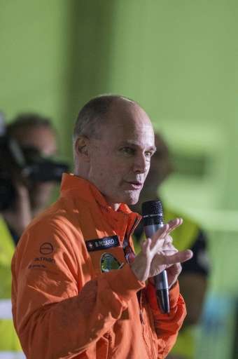 Pilot Bertrand Piccard talks to the media before his take-off in the Solar-powered Solar Impulse 2 aircraft, from the Cairo Inte