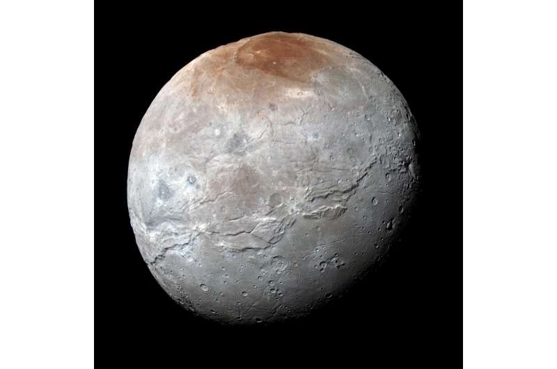 Pluto ‘paints’ its largest moon red