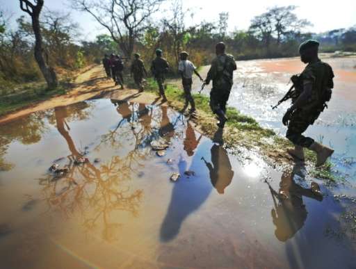 Rangers set out on the hunt for elephant poachers in the Garamba National Park in north-eastern Democratic Republic of Congo on 